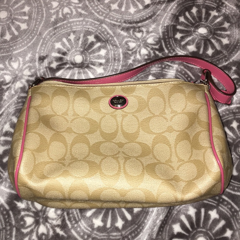 Tan and pink Coach purse